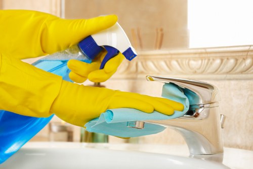 Spot cleaning a mattress stain with a cloth