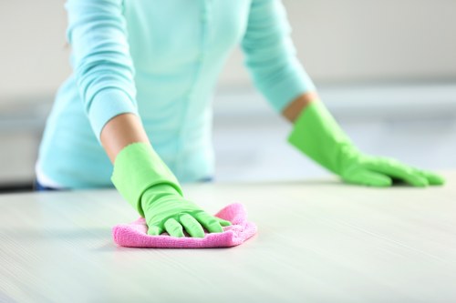 Janitorial staff cleaning a business lobby